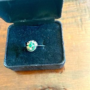 Ring.  green and clear stones